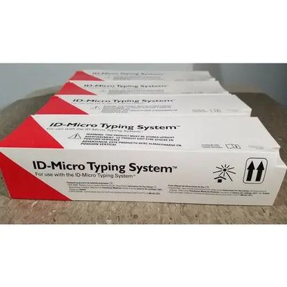 White and red cardboard box for grifols cards id-micro typing system with dilution trays for reuse medical applications