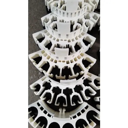 White plastic grifols cards component with tiered geometric design for dilution trays and evaporation caps use