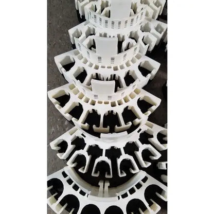 White plastic grifols cards component with tiered geometric design for dilution trays and evaporation caps use