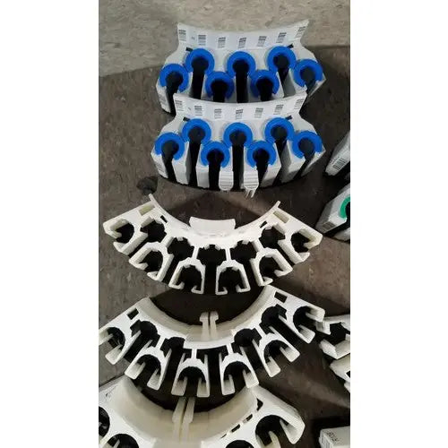 White plastic conduit connectors with blue rubber gaskets for grifols cards dilution trays and evaporation caps