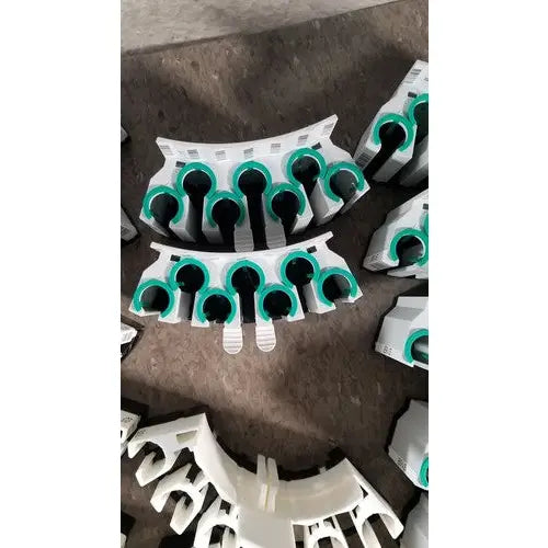 White plastic cable clips with teal rubber gaskets for grifols cards and dilution trays reuse medical applications