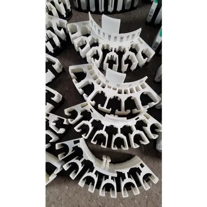 White plastic gutter seal strips with black rubber inserts for grifols cards and dilution trays reuse medical applications