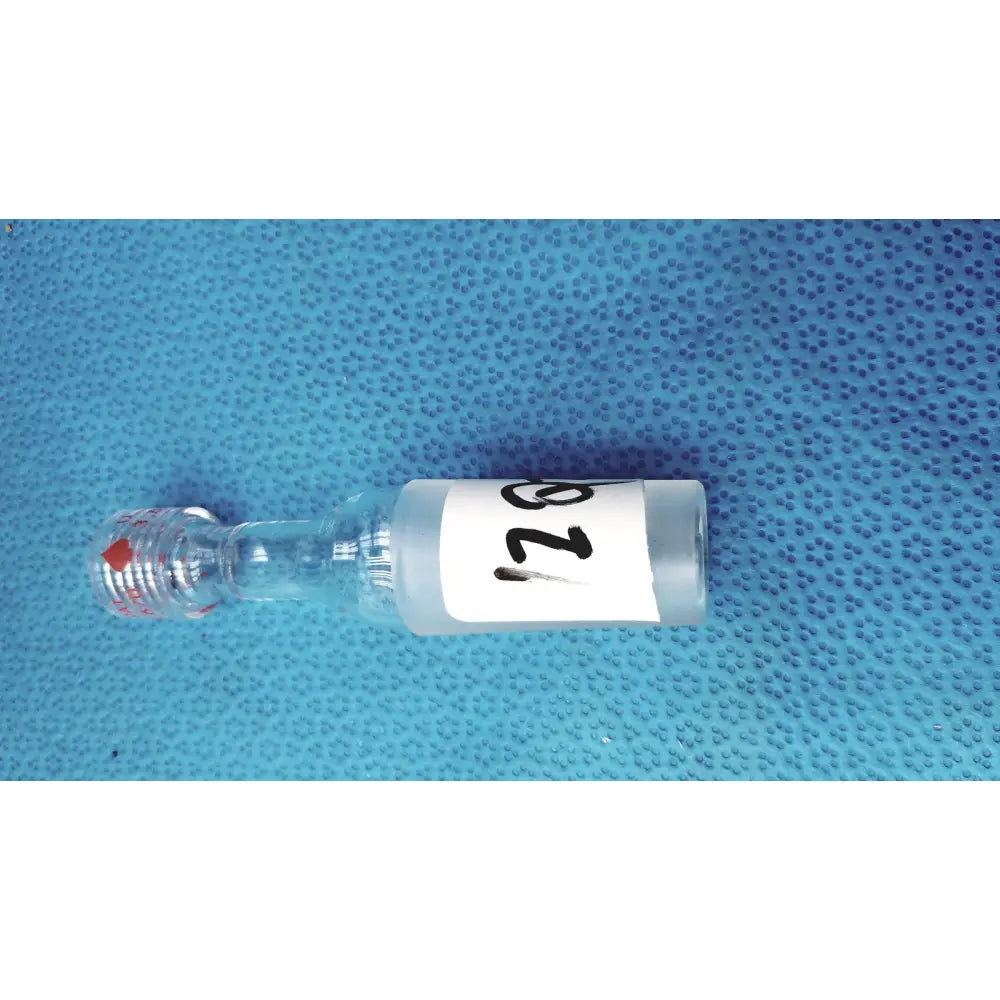 Clear glass vial with white label number 128 and red cap mark illustrating ground glass cone rubber tubing connector lab joint