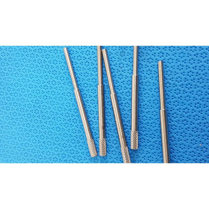 Five metallic cylindrical rods with knurled grips on a blue perforated surface for precision surgical beaver-style scalpel handle