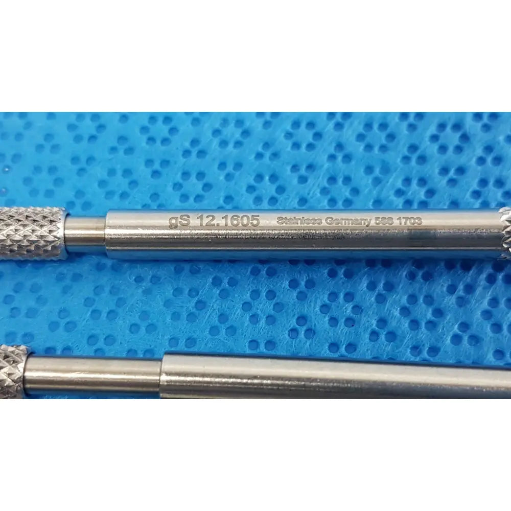 Silver stainless steel beaver-style scalpel handle with precision surgical engraved markings and textured grip