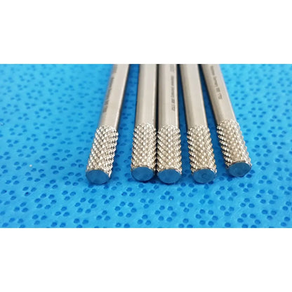 Five silver metal drill bits with knurled tips and blue ends for gs 12.1605 beaver-style scalpel handle precision surgical use