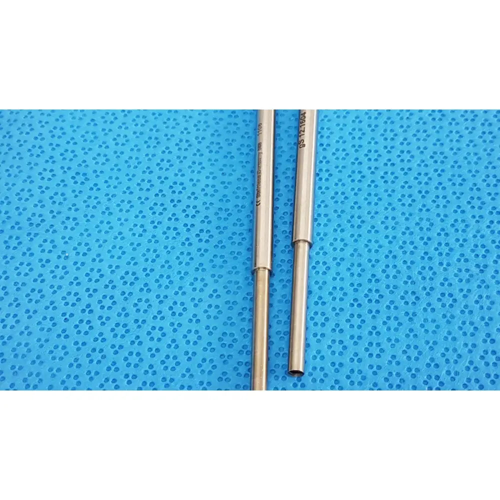 Two german stainless steel surgical scalpel handles gS12.1604 beaver-style with engraved markings on blue surface