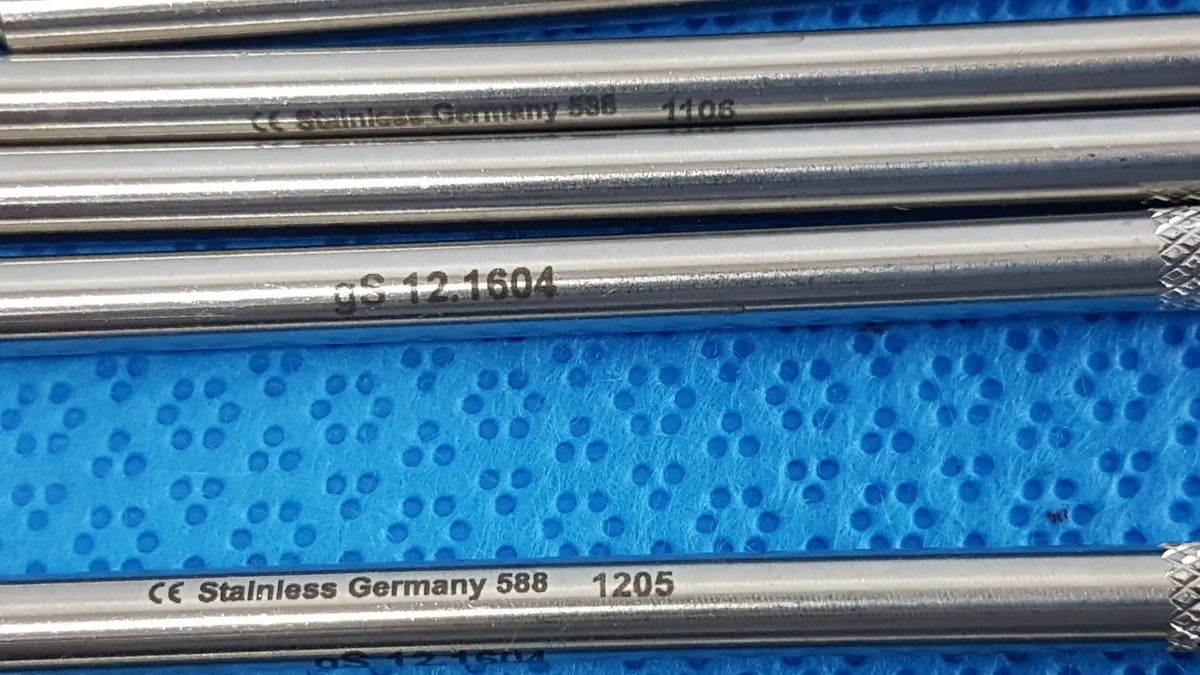 Silver german stainless steel surgical scalpel handle rods with engraved markings on blue textured surface lot of 6