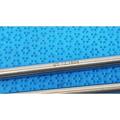 A sleek metallic german stainless steel surgical scalpel handle with engraved gs 12.1604 for precision use