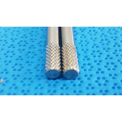 Two silver german stainless steel surgical scalpel handles with diamond-patterned blue-tipped drill bits gS12.1604
