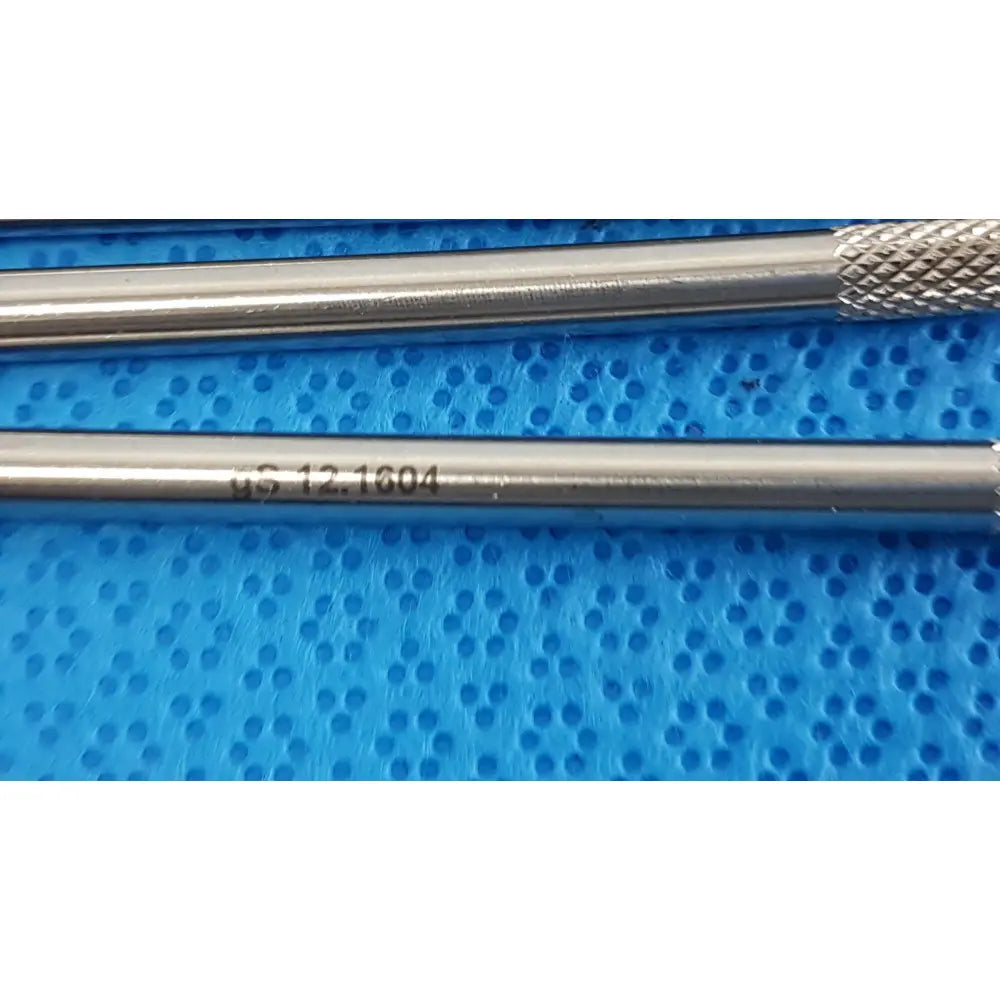 Silver german stainless steel surgical scalpel handle with textured grip and engraved markings for precise use