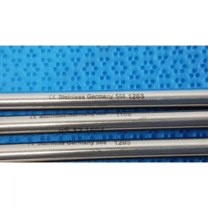 Four parallel german stainless steel surgical scalpel handles engraved with model numbers for precise medical use