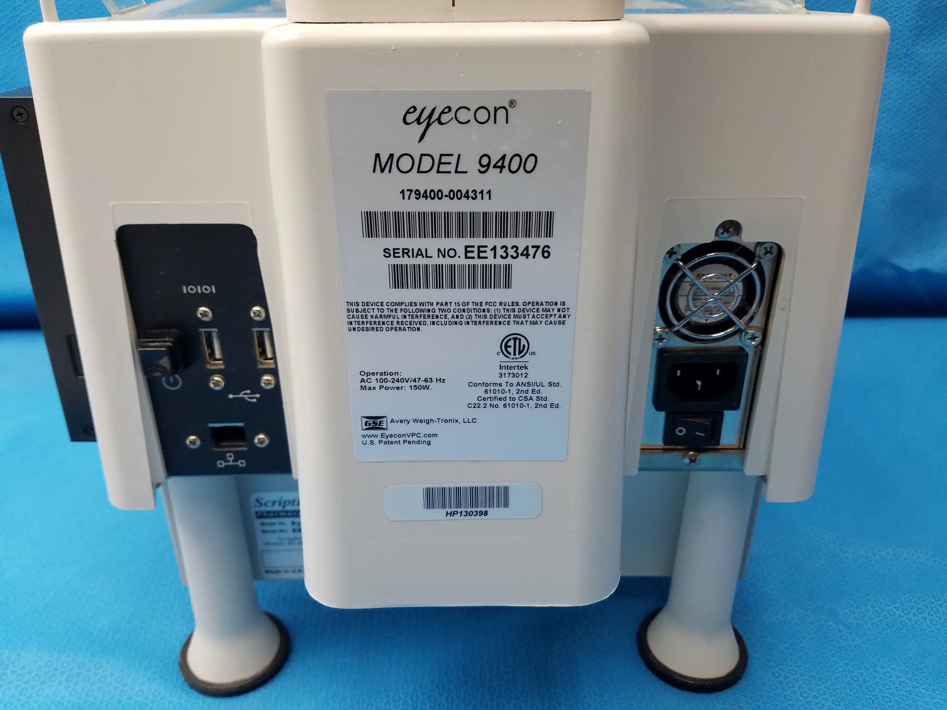 White plastic GSE Eyecon 9400 optical pill counter with black ports and cooling fan for pharmacy optical counting tasks