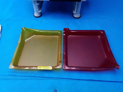 Two glossy plastic trays in olive green with gold interior and deep red for gse eyecon 9400 optical pill counter