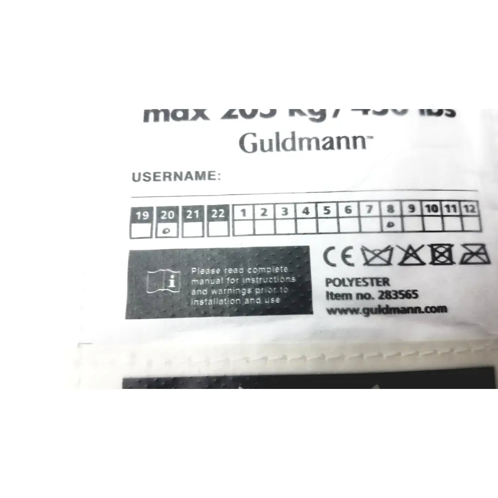 Label of guldmann disposable gait trainer max 205 kg 450 lbs size large showing max weight and care instructions
