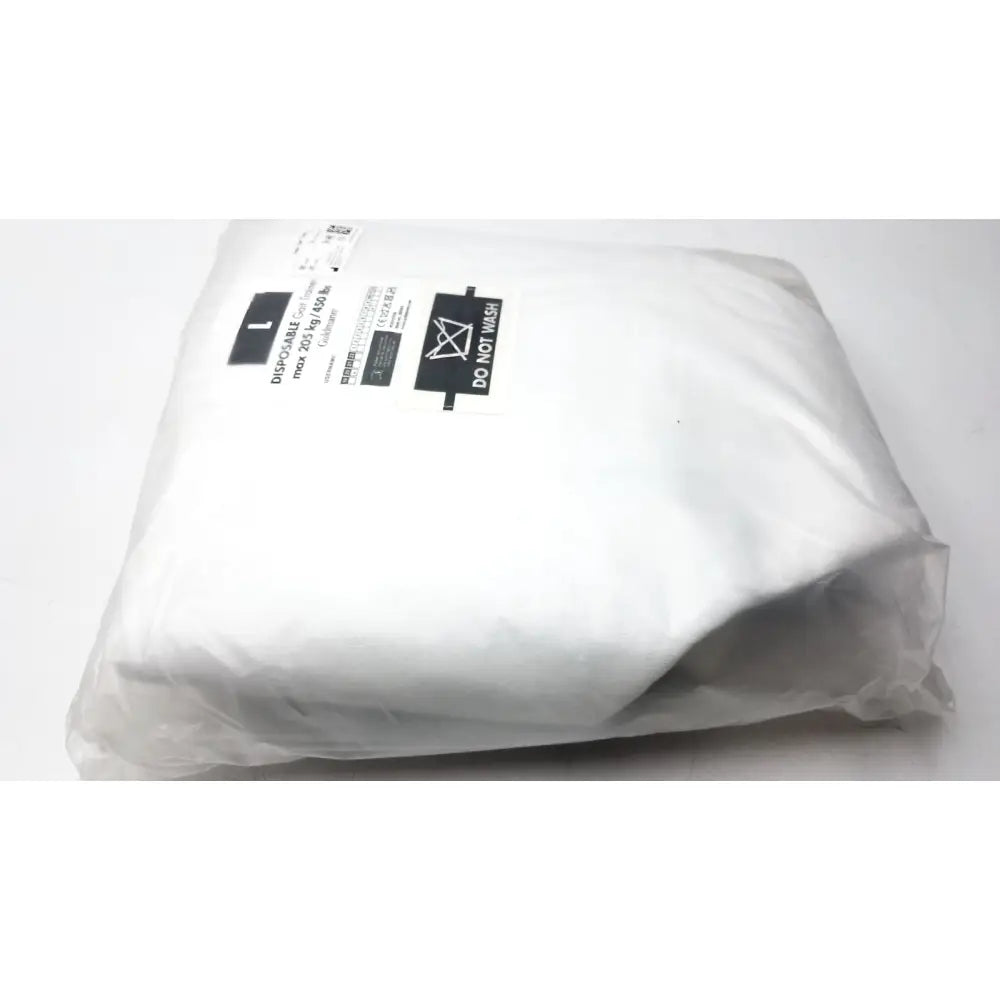 A white crinkled plastic bag with a black disposable label for guldmann disposable gait trainer max 205 kg size large