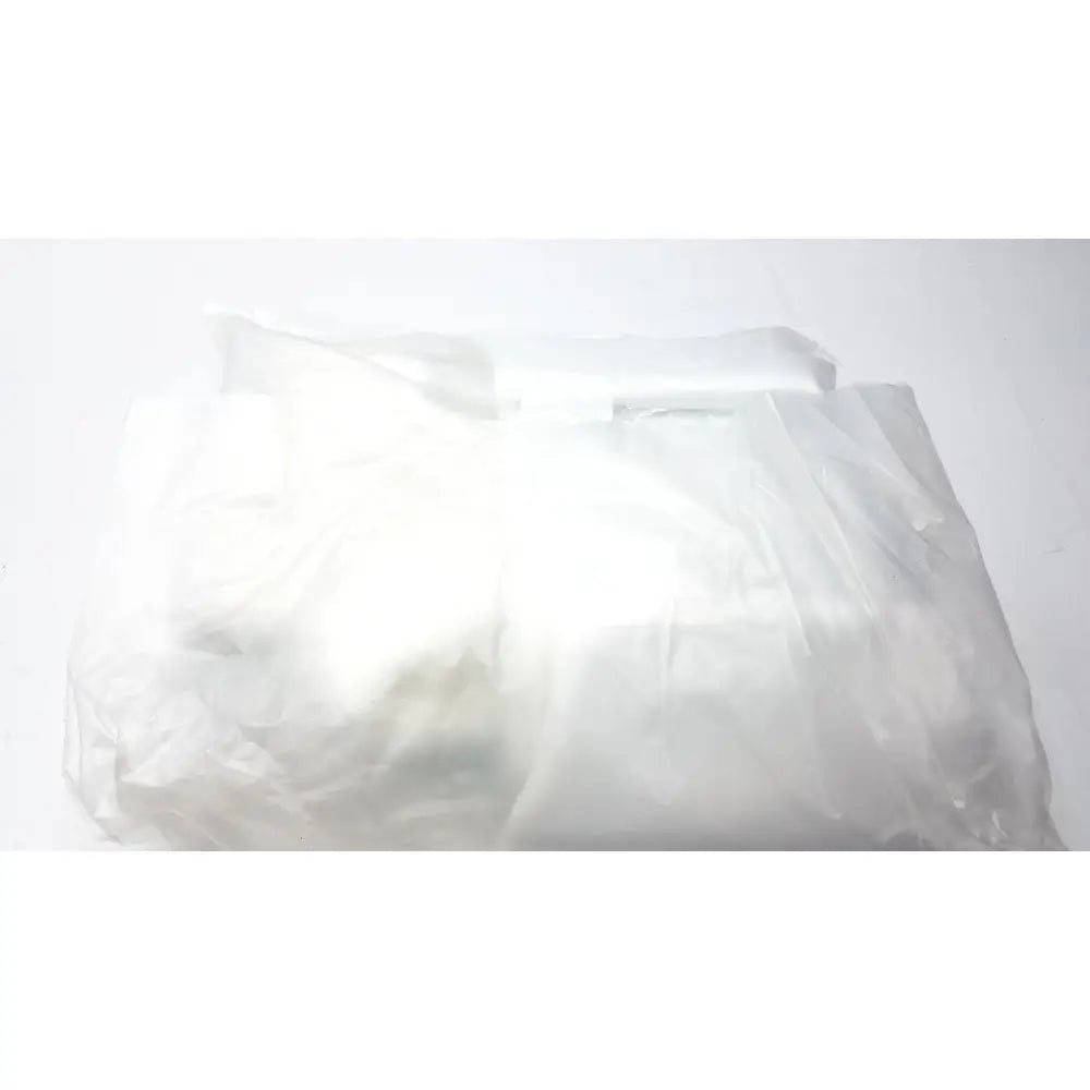 A crumpled translucent white plastic bag for guldmann disposable gait trainer max 205 kg size large packaging