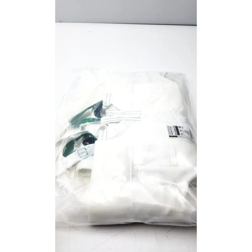 White protective suit with green accents and sleeve label in guldmann disposable micro plus sling max 250kg size XL