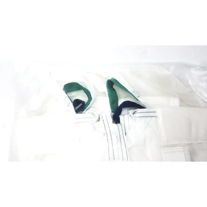 White martial arts gi with green and black trim featured in guldmann disposable micro plus sling max 250kg size xl