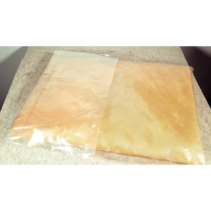 Beige textured fabric guldmann repositioning sling max 500 kg sealed in clear plastic bag