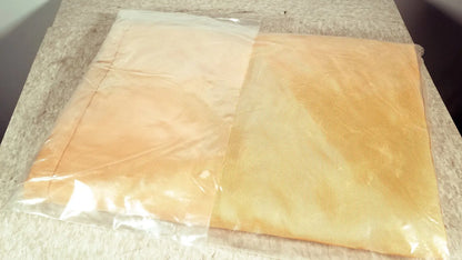 Beige textured fabric guldmann repositioning sling max 500 kg sealed in clear plastic bag