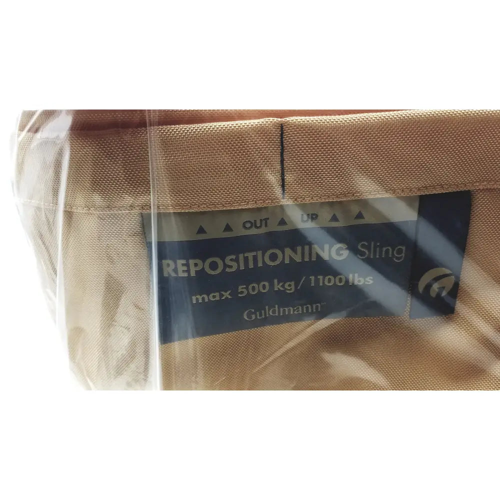Tan fabric guldmann repositioning sling max 500 kg designed for safe patient transfer and repositioning