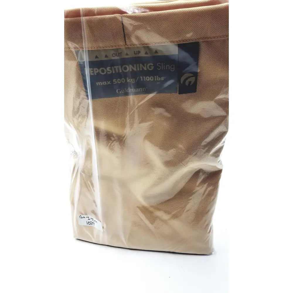 Tan fabric guldmann repositioning sling max 500 kg in clear plastic packaging supporting up to 1100 lbs capacity
