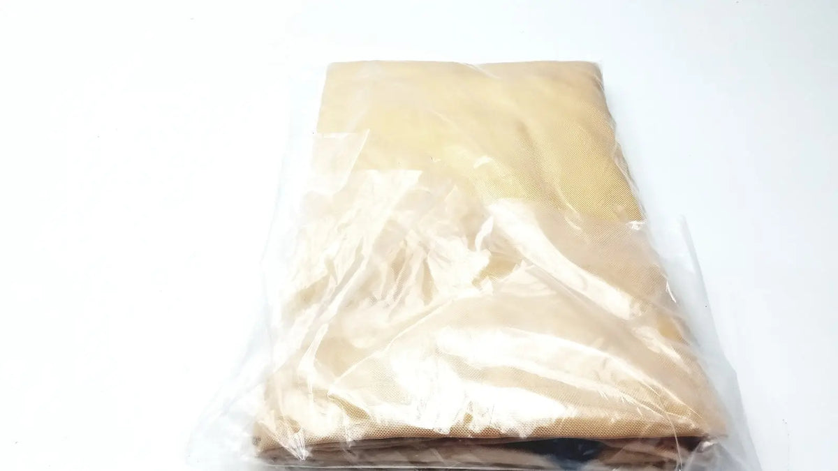 Beige fabric guldmann repositioning sling max 500 kg folded and wrapped in clear plastic packaging