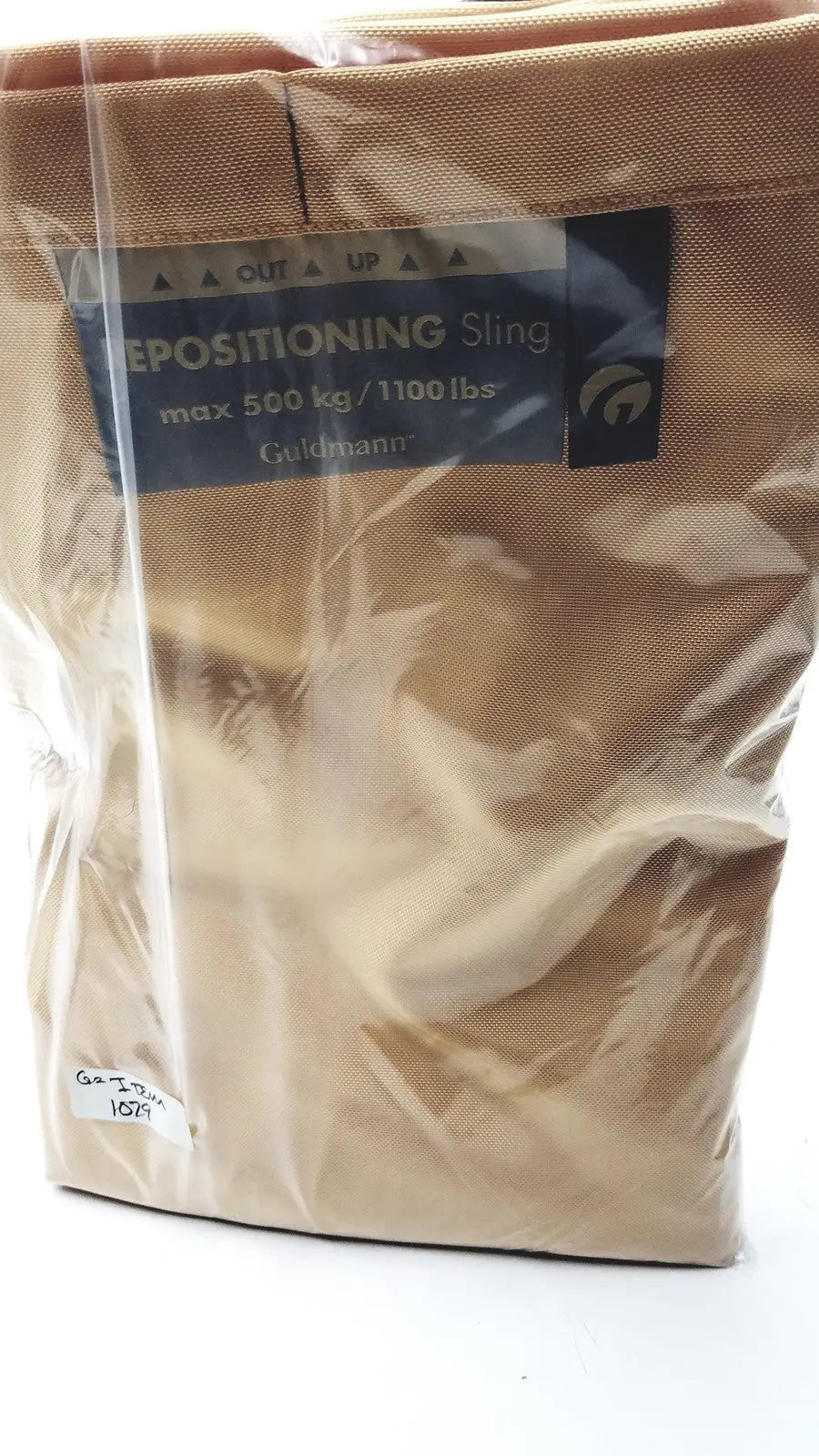 Tan fabric guldmann repositioning sling max 500 kg in clear plastic packaging supporting up to 1100 lbs capacity