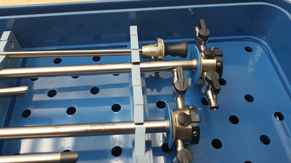 Gyrus acmi endoscopic surgical instrument set with metallic shafts and black handles branded olympus germany