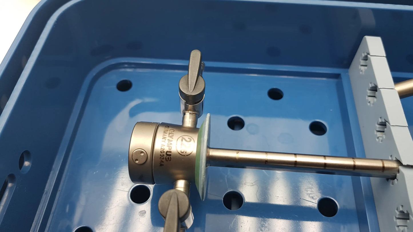 Gyrus acmi metallic surgical instrument with knurled handle and engraved markings from endoscopic instrument set