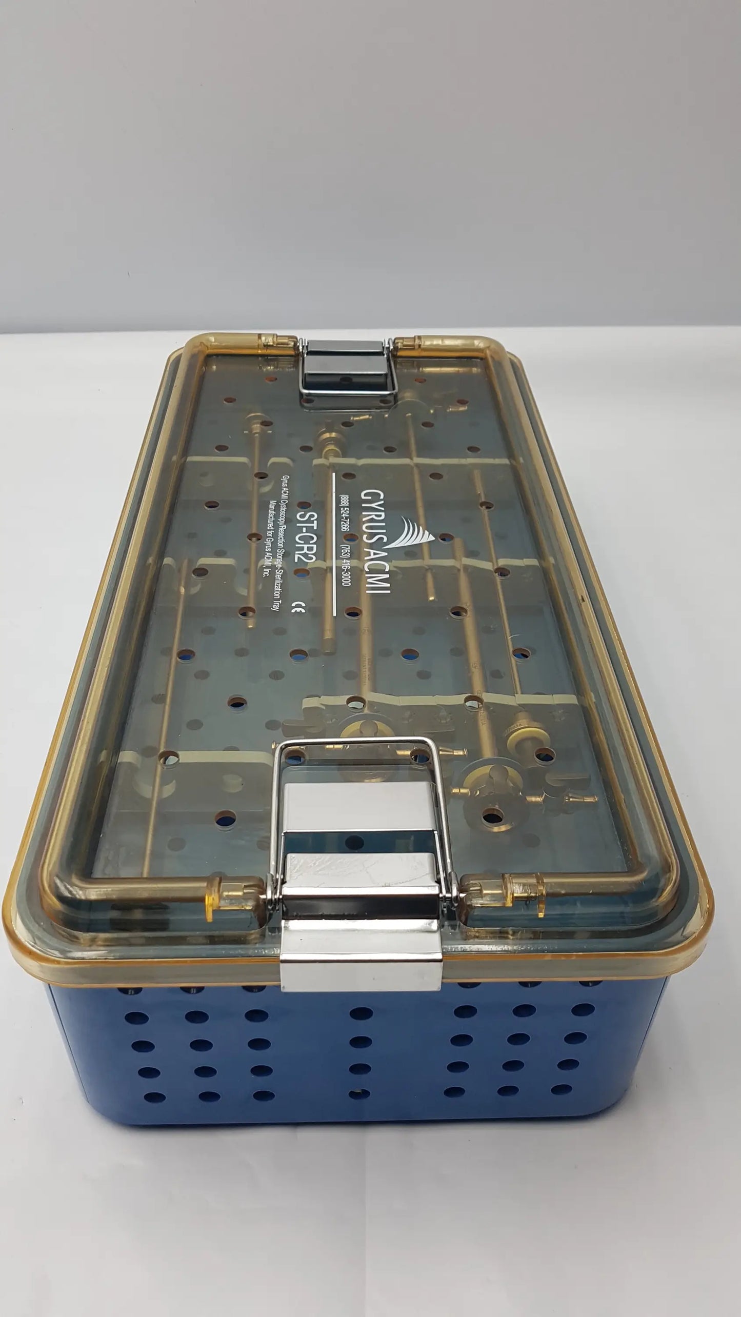 Blue perforated gyrus acmi endoscopic surgical instrument set with transparent lid and metallic latches branded crus admi
