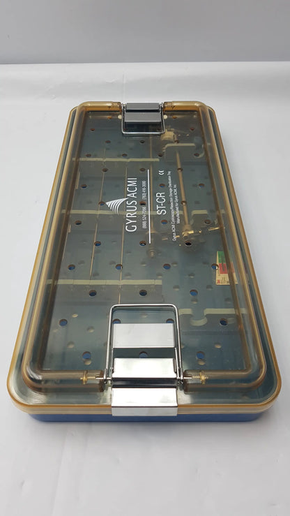 Transparent plastic endoscope sterilization tray with gold metal latches and blue base featuring olympus a3551 urethrotome sheath