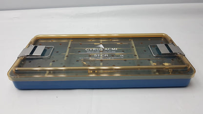 Blue and gold endoscope sterilization tray with silver metal clasps featuring olympus a3551 urethrotome sheath and obturator