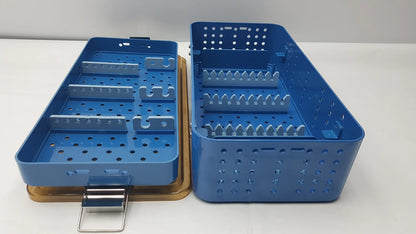 Blue plastic gyrus acmi endoscope storage tray with perforated sides and internal compartments for sterilization