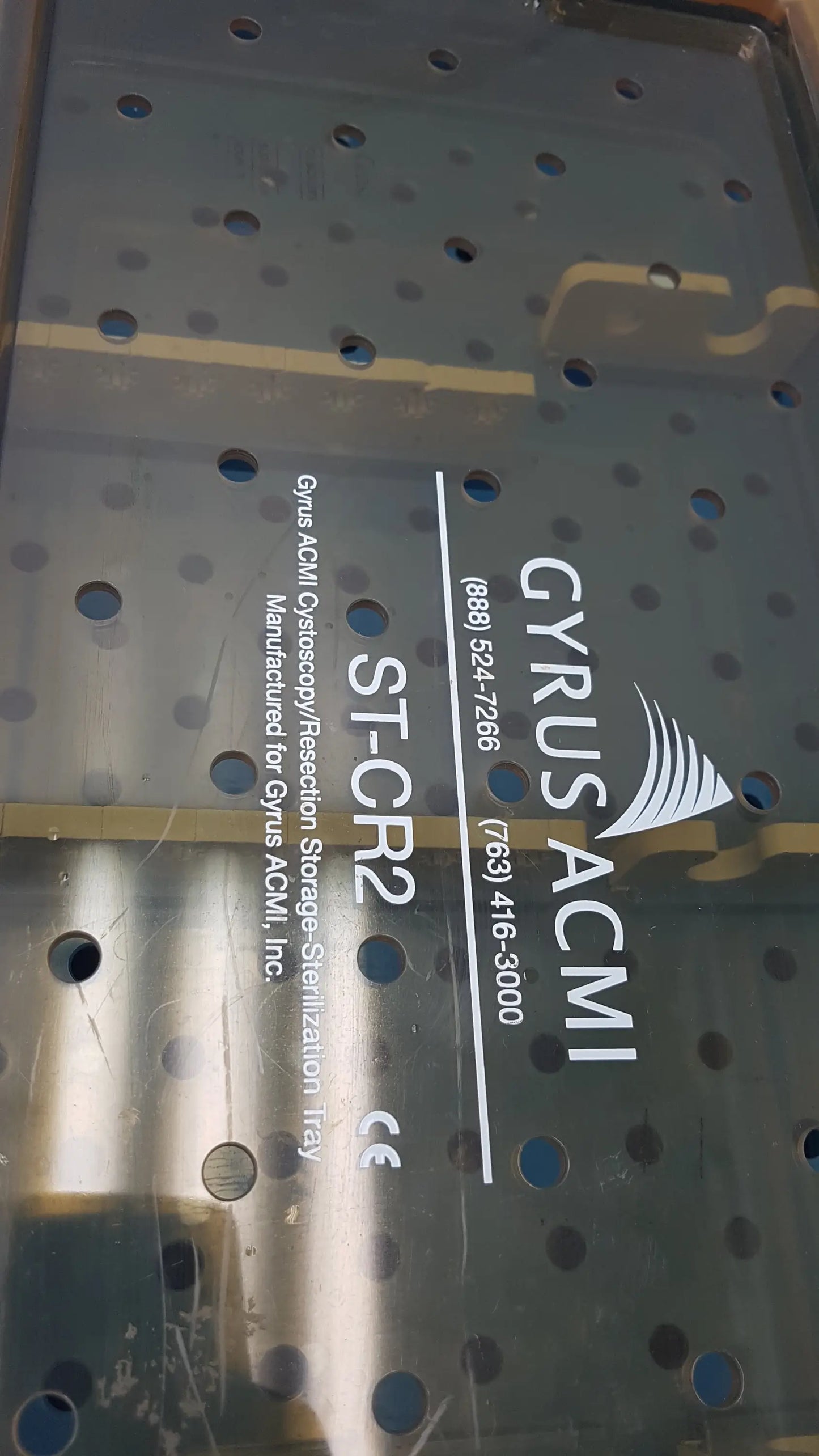 Clear plastic perforated gyrus acmi endoscope storage tray for sterilization and organized endoscope storage
