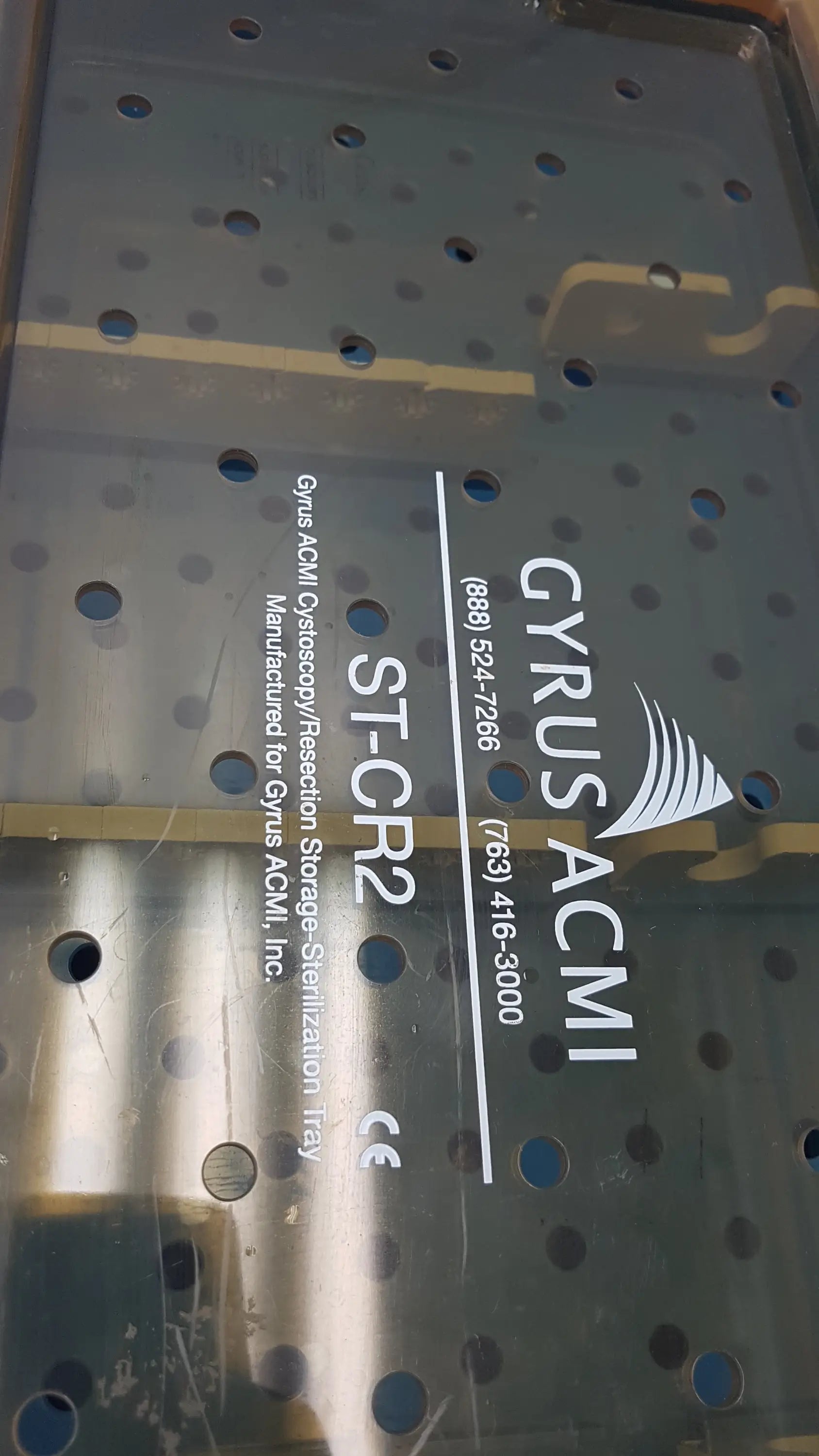 Clear plastic perforated gyrus acmi endoscope storage tray for sterilization and organized endoscope storage