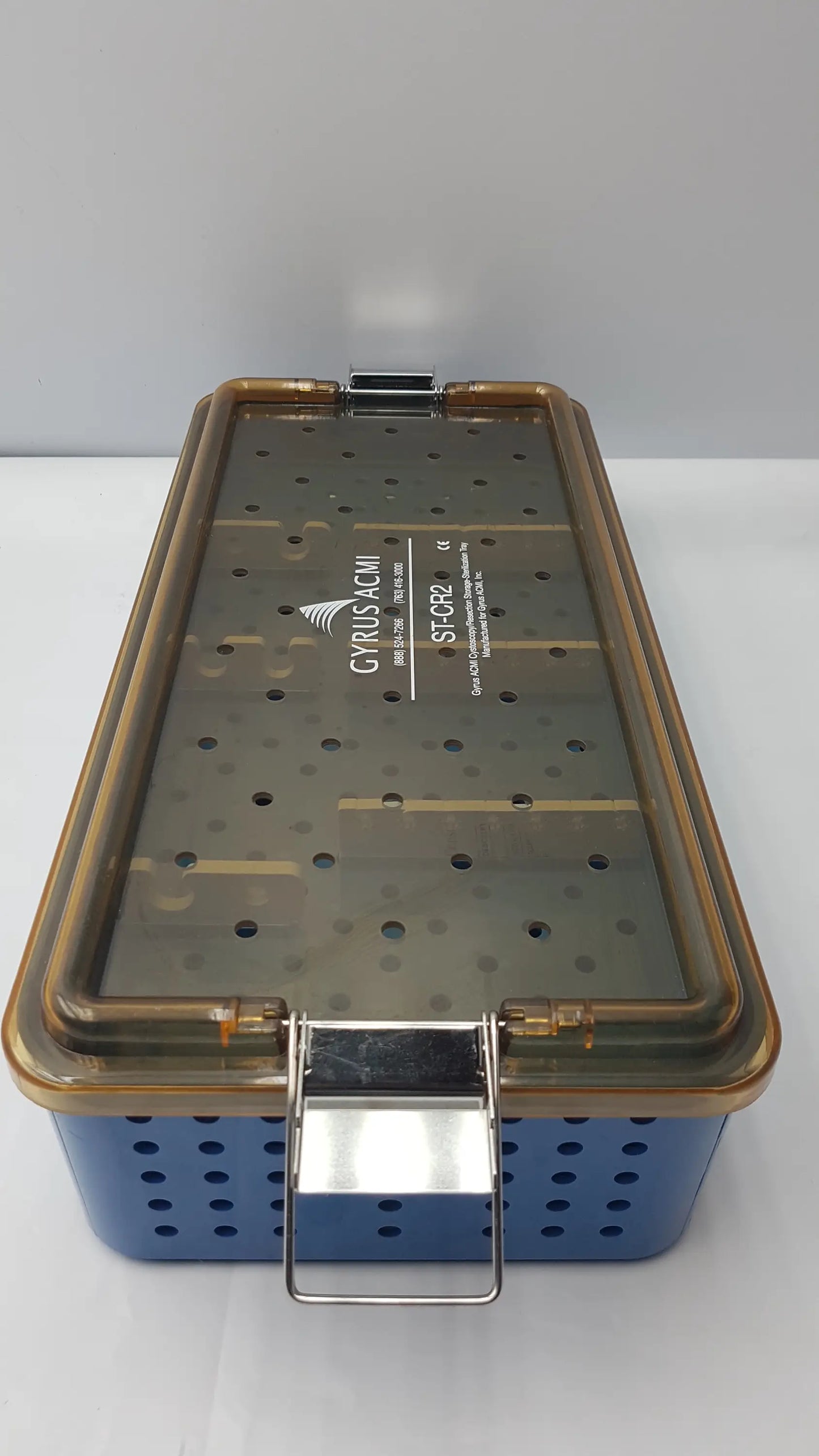 Blue perforated gyrus acmi endoscope storage tray with transparent lid and metallic clasp for sterilization use
