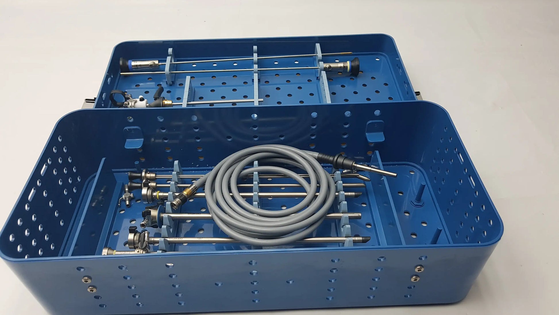 Blue gyrus acmi st-cr2 endoscope storage sterilization tray with neatly organized olympus telescopes and coiled tube