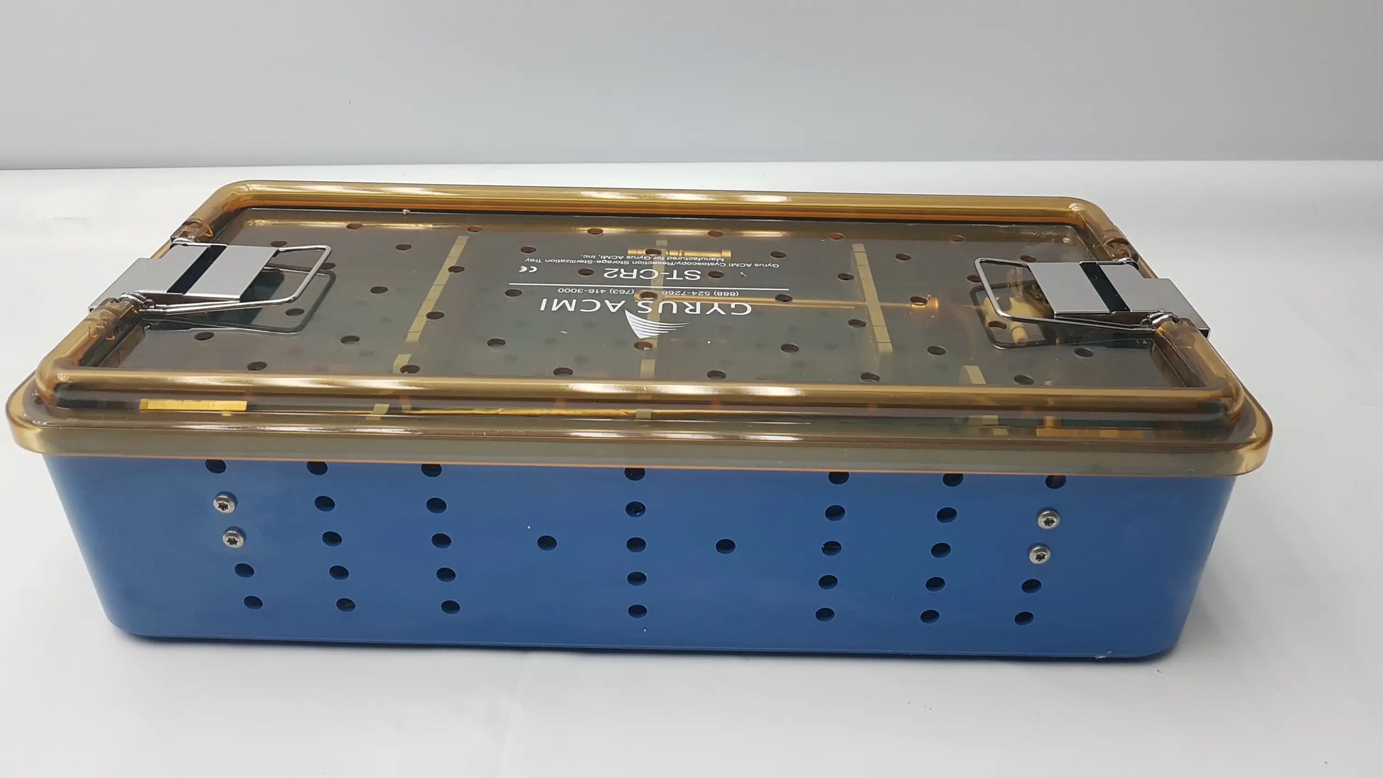 Blue gyrus acmi endoscope storage sterilization tray with gold metal lid and perforated sides for olympus telescopes