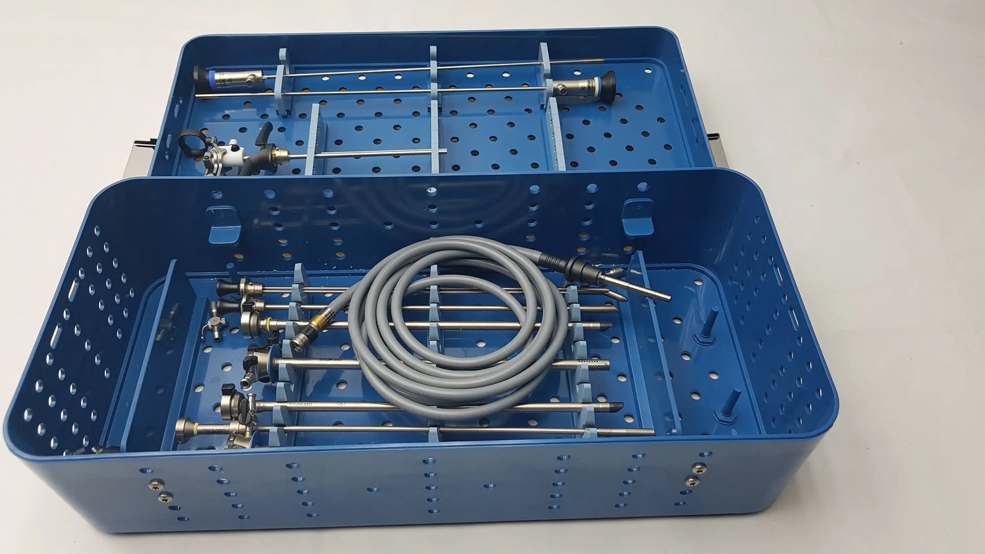 Blue gyrus acmi st-cr2 endoscope storage sterilization tray with neatly organized medical tools and olympus telescopes