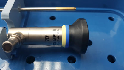 Silver olympus 70° endoscope with black and yellow-blue striped tip in gyrus acmi st-cr2 endoscope storage sterilization tray