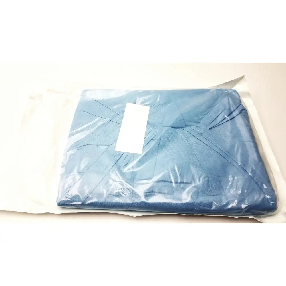 Blue quilted orthoarts shoulder split drape wrapped in clear plastic with white label for medical use