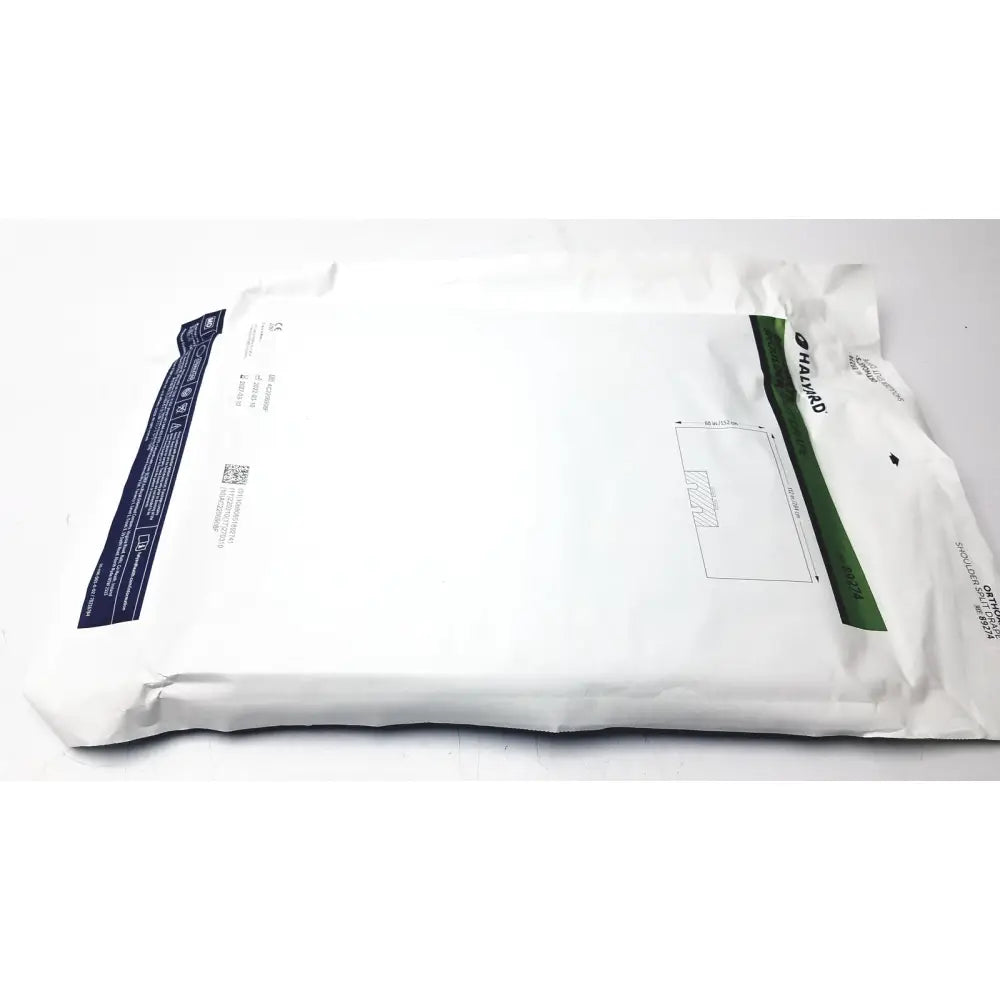 White padded envelope with navy and green branding stripes for halyard 89274 orthoarts shoulder split drape packaging