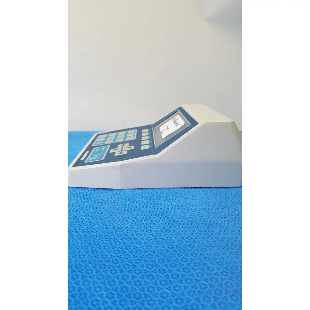 White plastic keypad controller with blue buttons and digital display for hamilton 2373-01 liquid handling system reuse medical