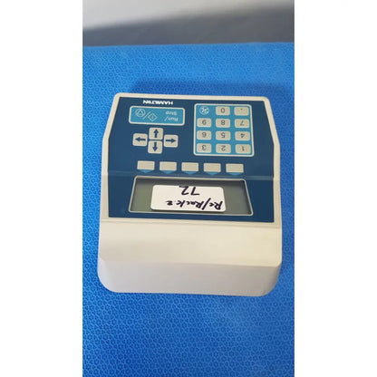 Blue and white Hamilton 2373-01 keypad controller with numeric keys and function buttons for liquid handling systems