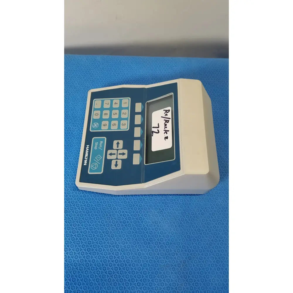 Beige and blue Hamilton 2373-01 keypad controller with screen and directional buttons for liquid handling and reuse medical systems