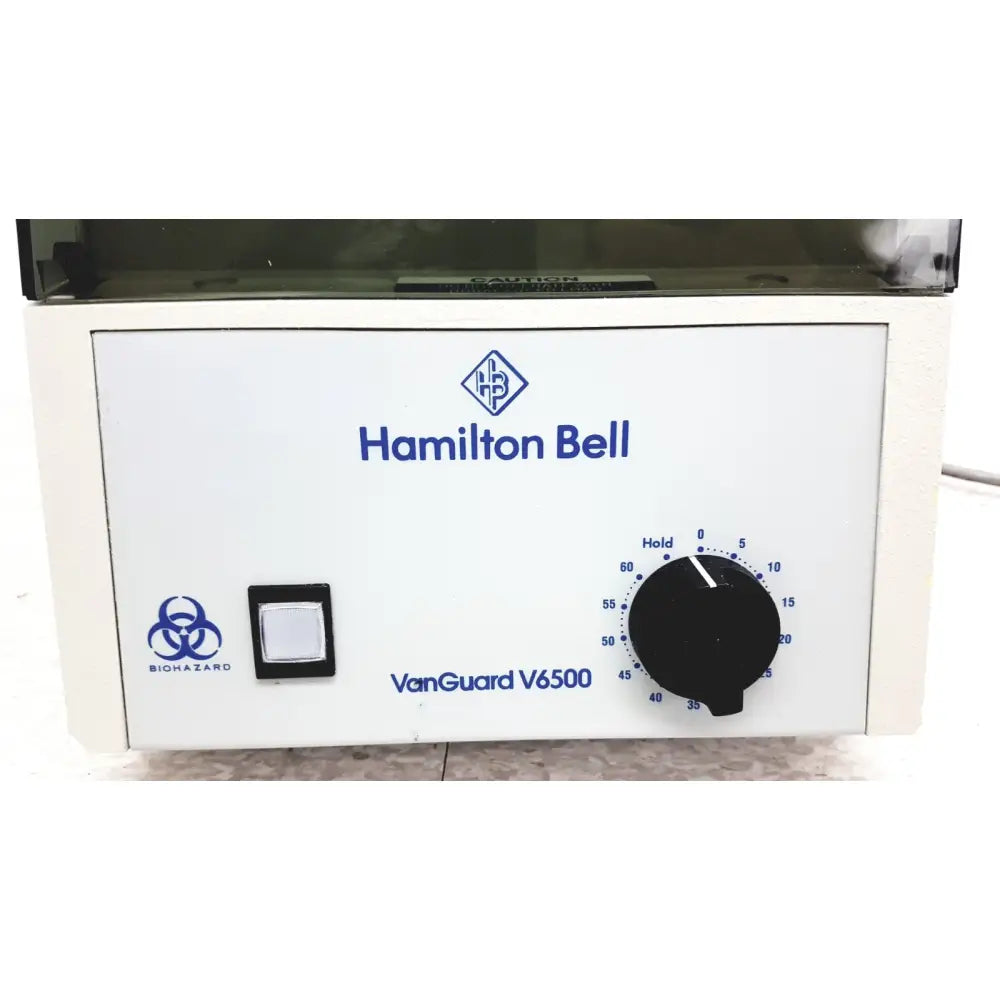 Hamilton bell vanguard v6500 laboratory centrifuge with white casing black control dial and power switch for 6-cell use