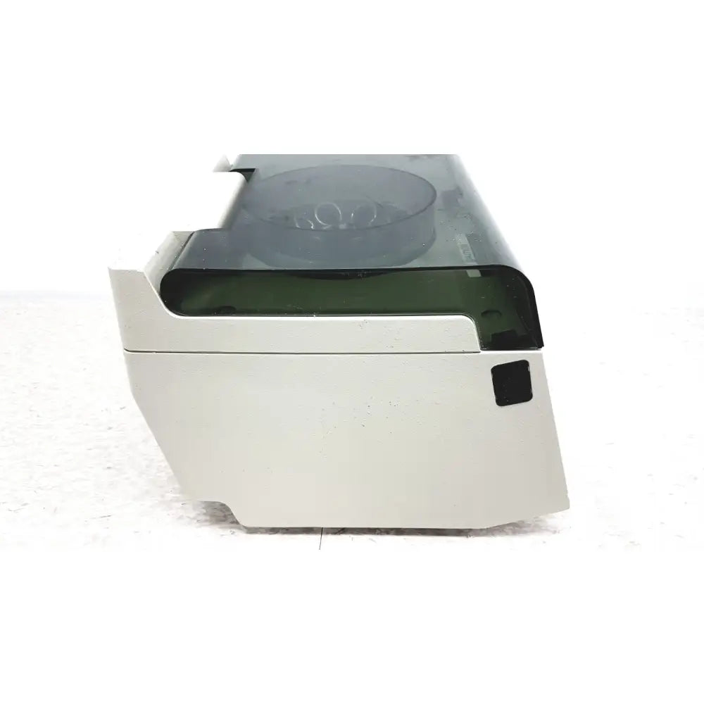 Off-white hamilton bell vanguard v6500 6-cell centrifuge with transparent lid and dark green interior chamber