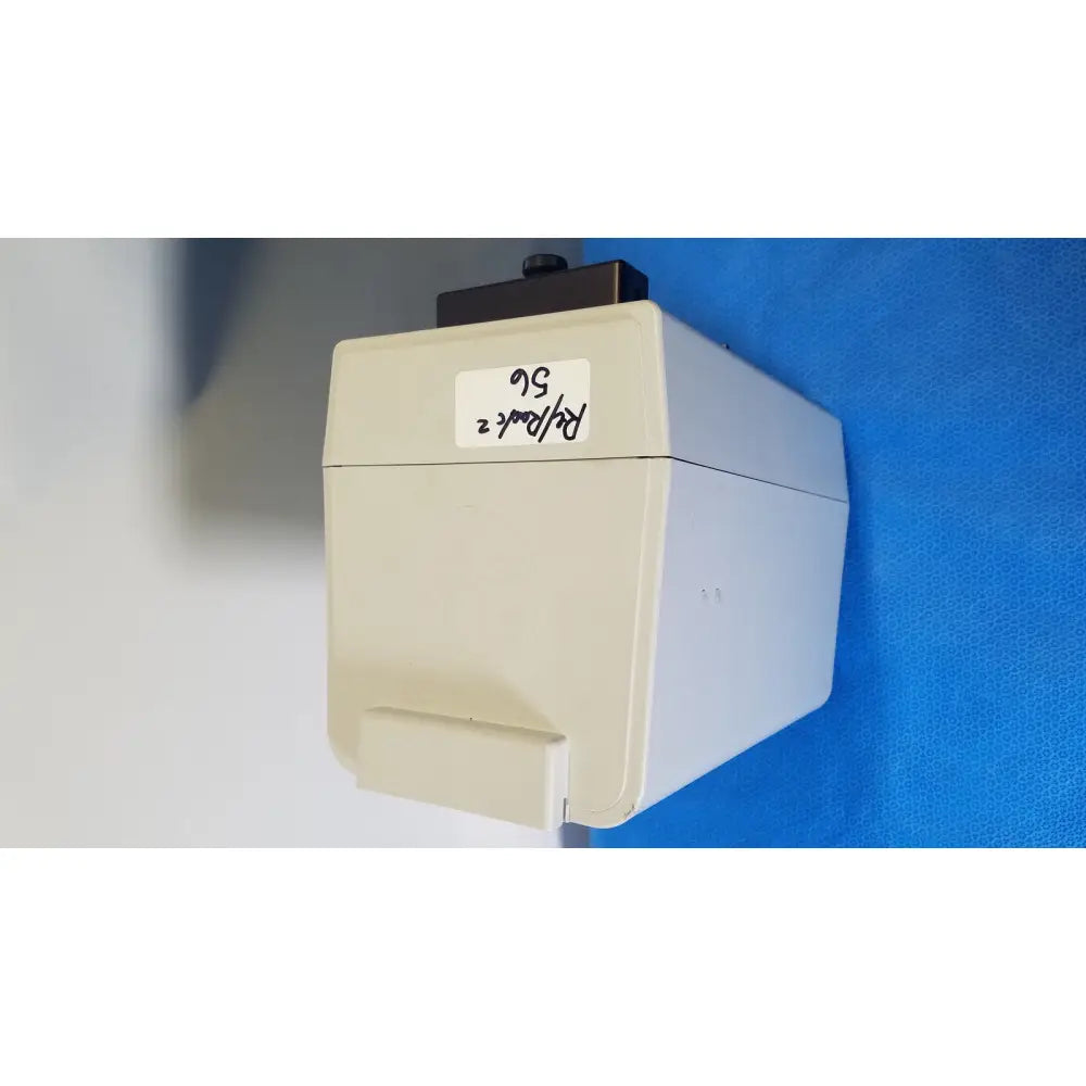Beige plastic hamilton microlab 500 series diluter dispenser with black top and white label p 2 56 on its side